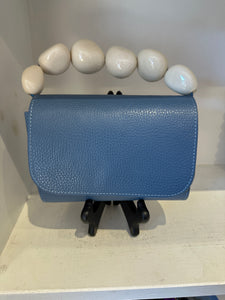 The Nica Leather Clutch in Blue