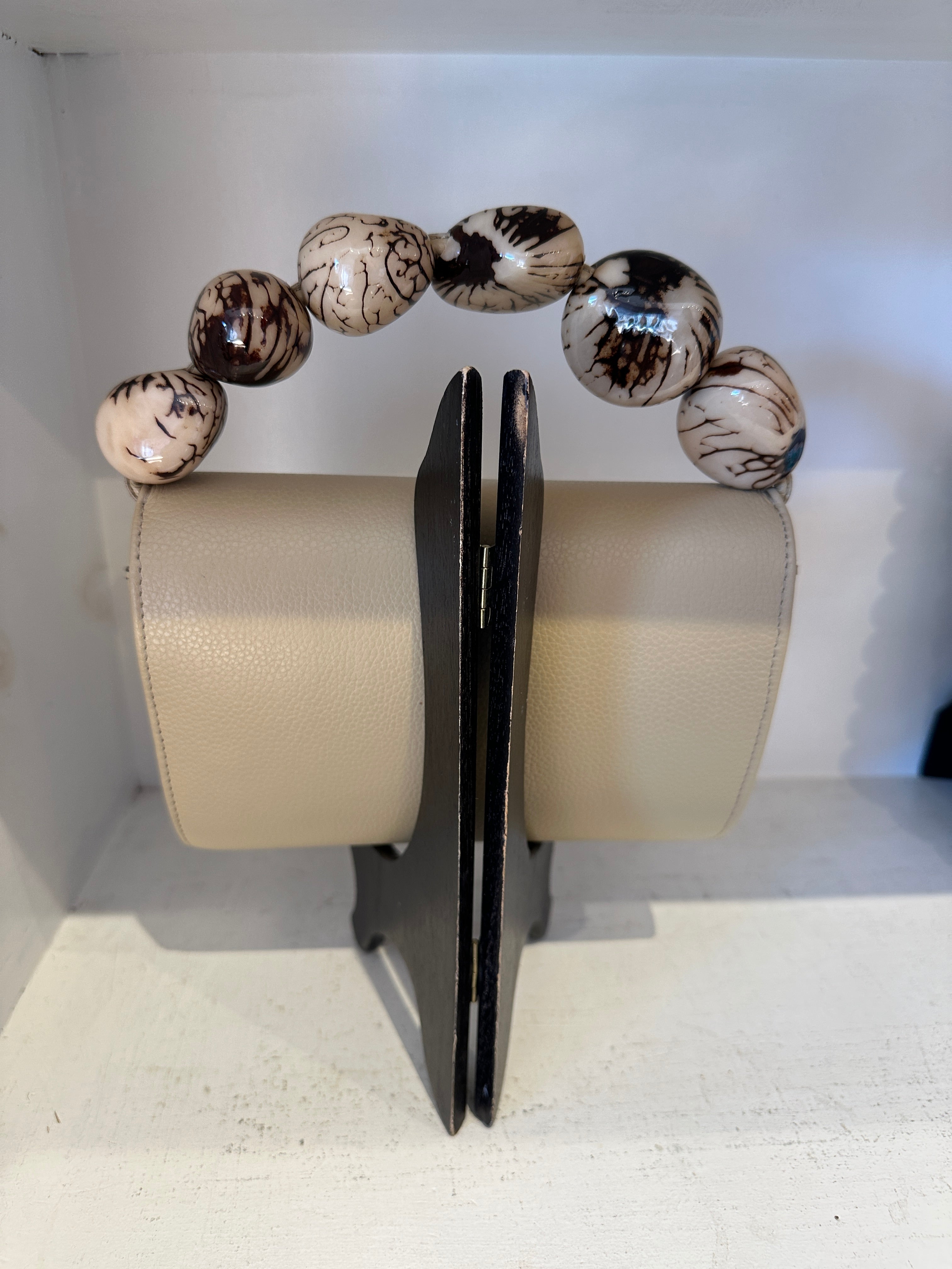The Nica Leather Clutch in Taupe