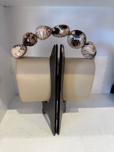 The Nica Leather Clutch in Taupe