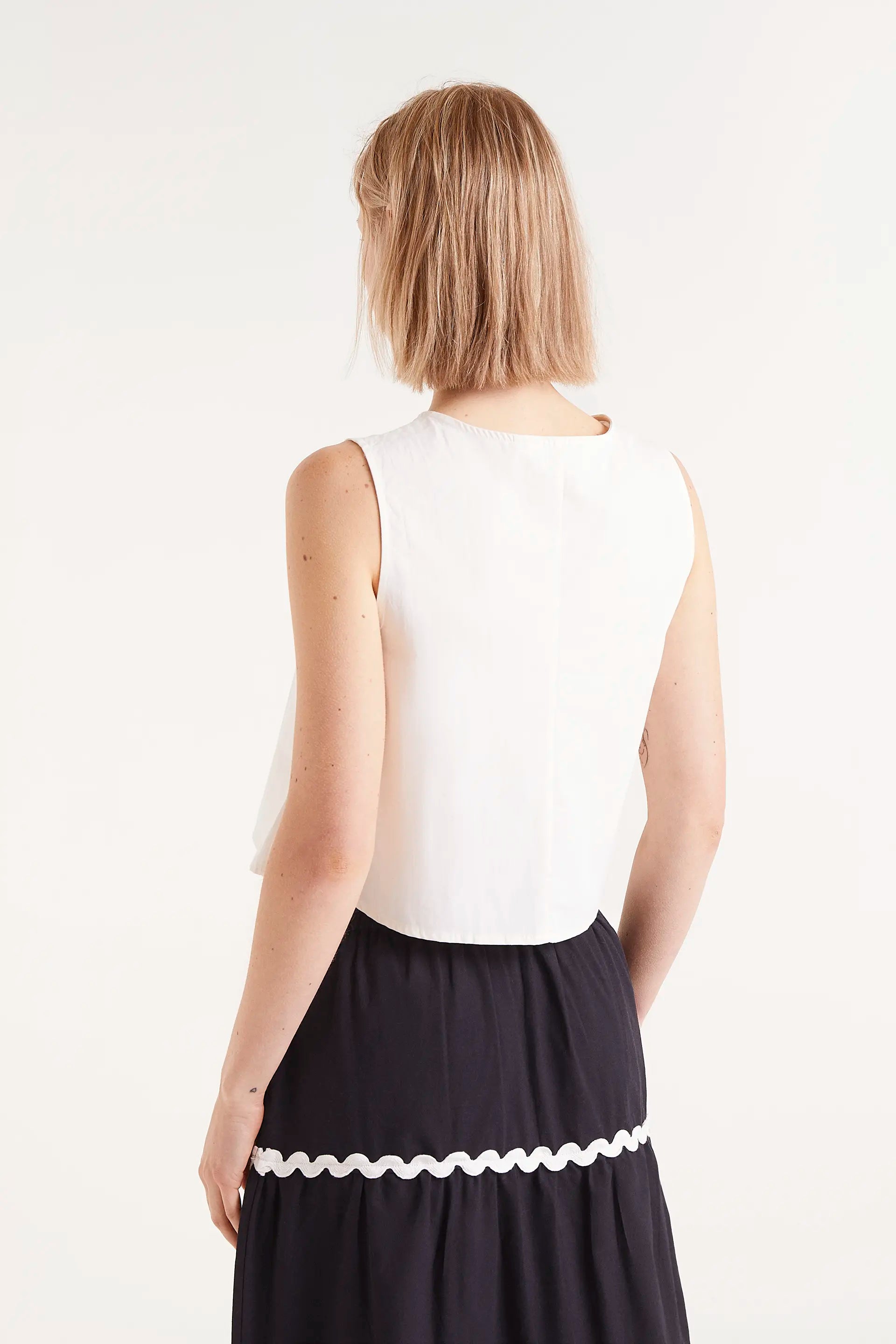 Sleeveless Top with Heart Buttons in White