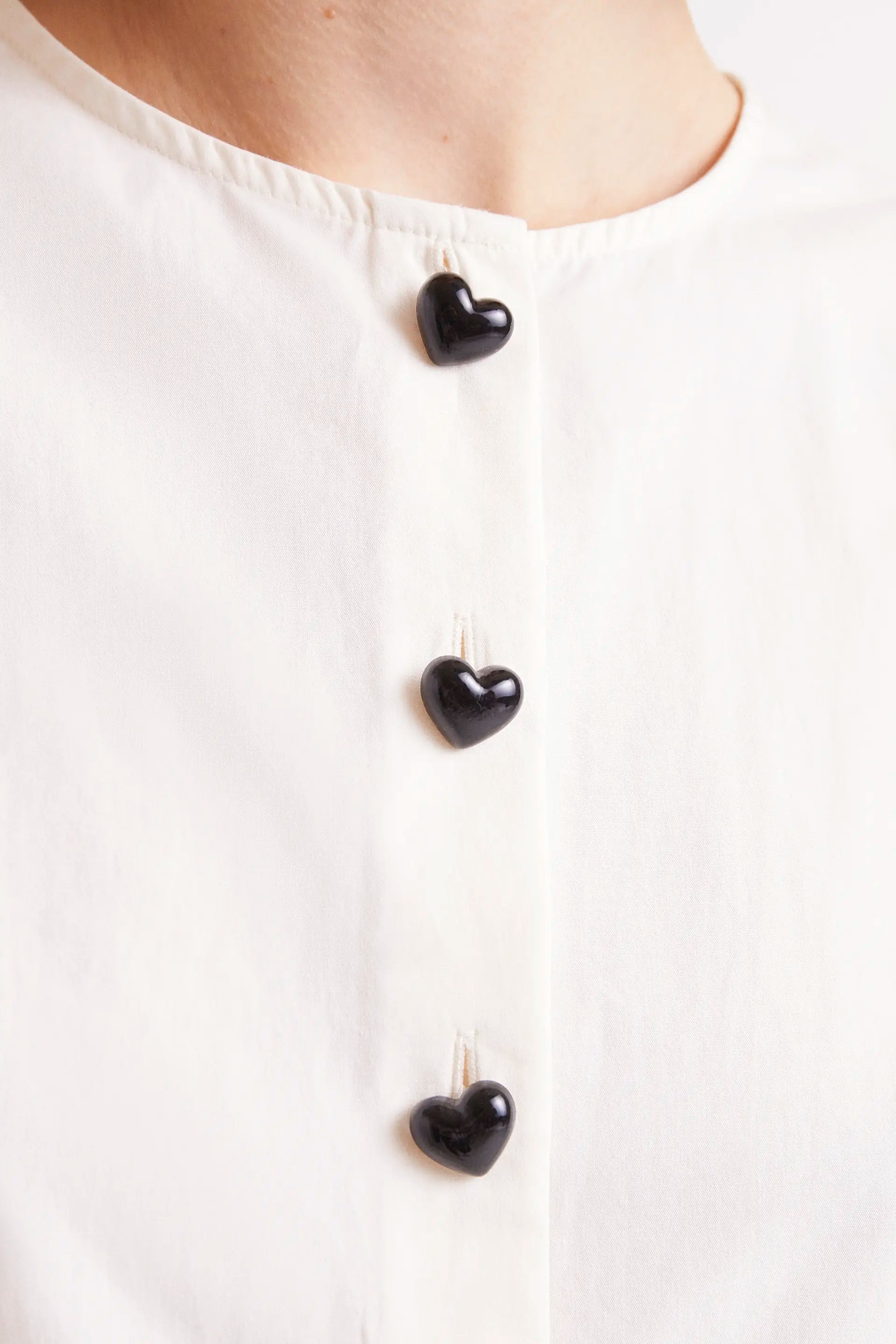 Sleeveless Top with Heart Buttons in White