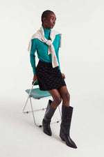 Load image into Gallery viewer, Polka Dot Knit Mini Skirt in Black
