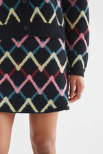 Load image into Gallery viewer, Skein Knit Mini Skirt in Black
