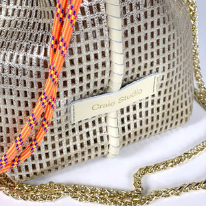 Bibi Perforated Lamb Leather Bag in Gold Metallic