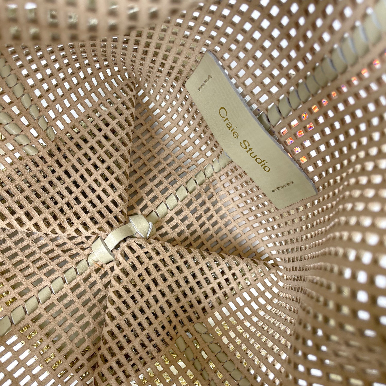 Bibi Perforated Lamb Leather Bag in Gold Metallic