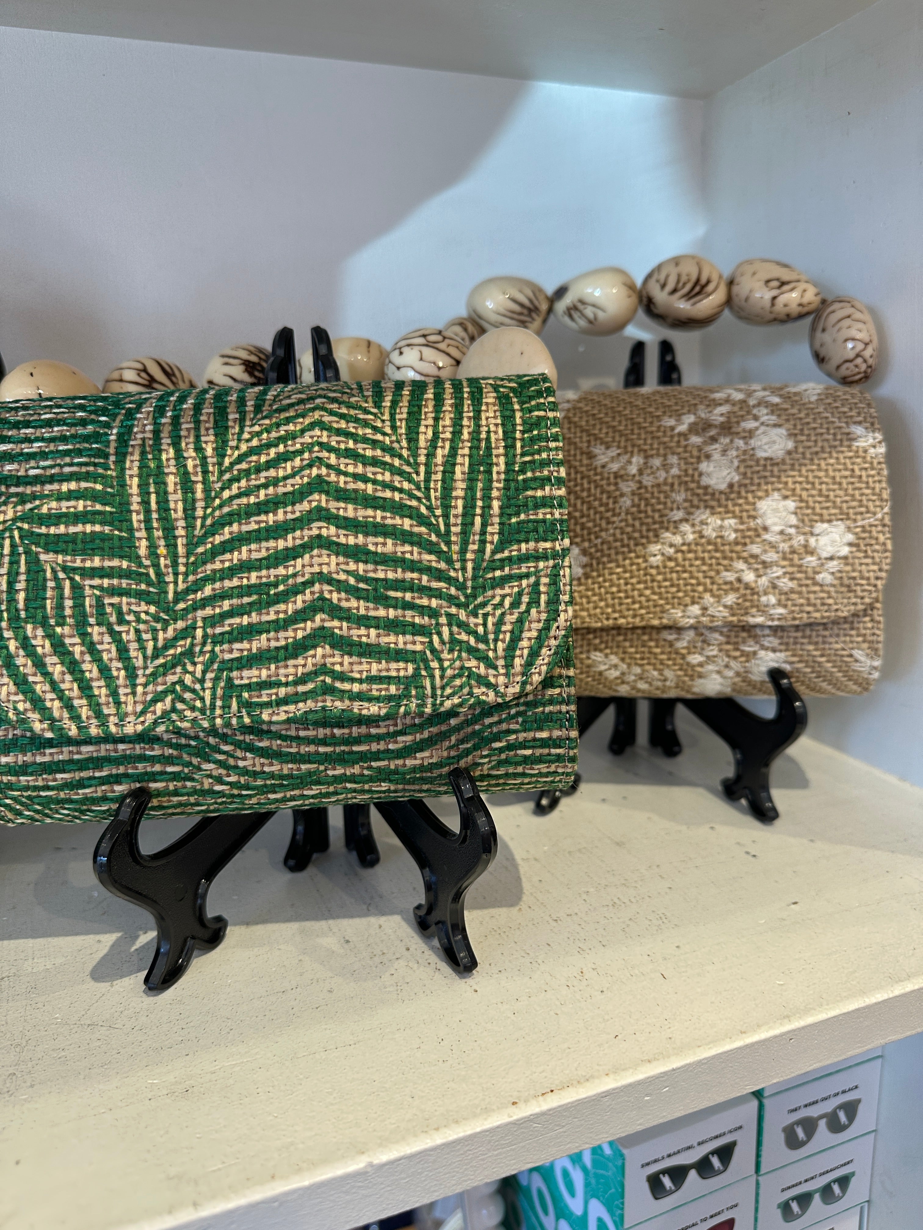 The Nica Rattan Clutch in Palma Green