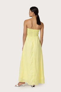 lusana melody linen maxi dress Melody Maxi Dress in Peach. A soft linen silhouette defined by our signature two tone twist bodice and fluid full length skirt. Feminine, effortless and designed for warm summer evenings.