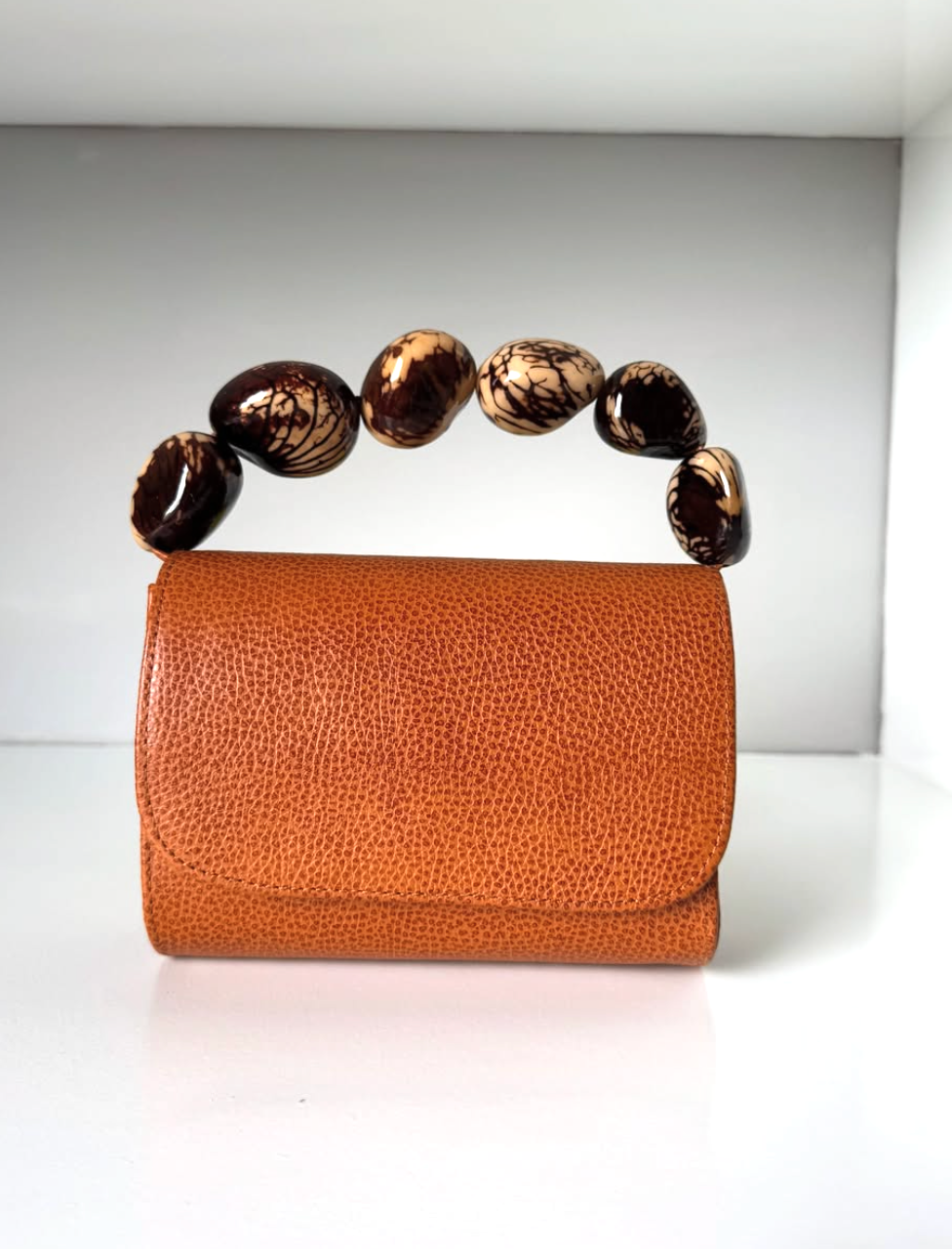 The Nica Leather Clutch in Cognac