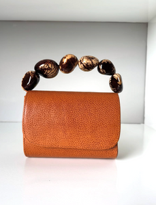 The Nica Leather Clutch in Cognac