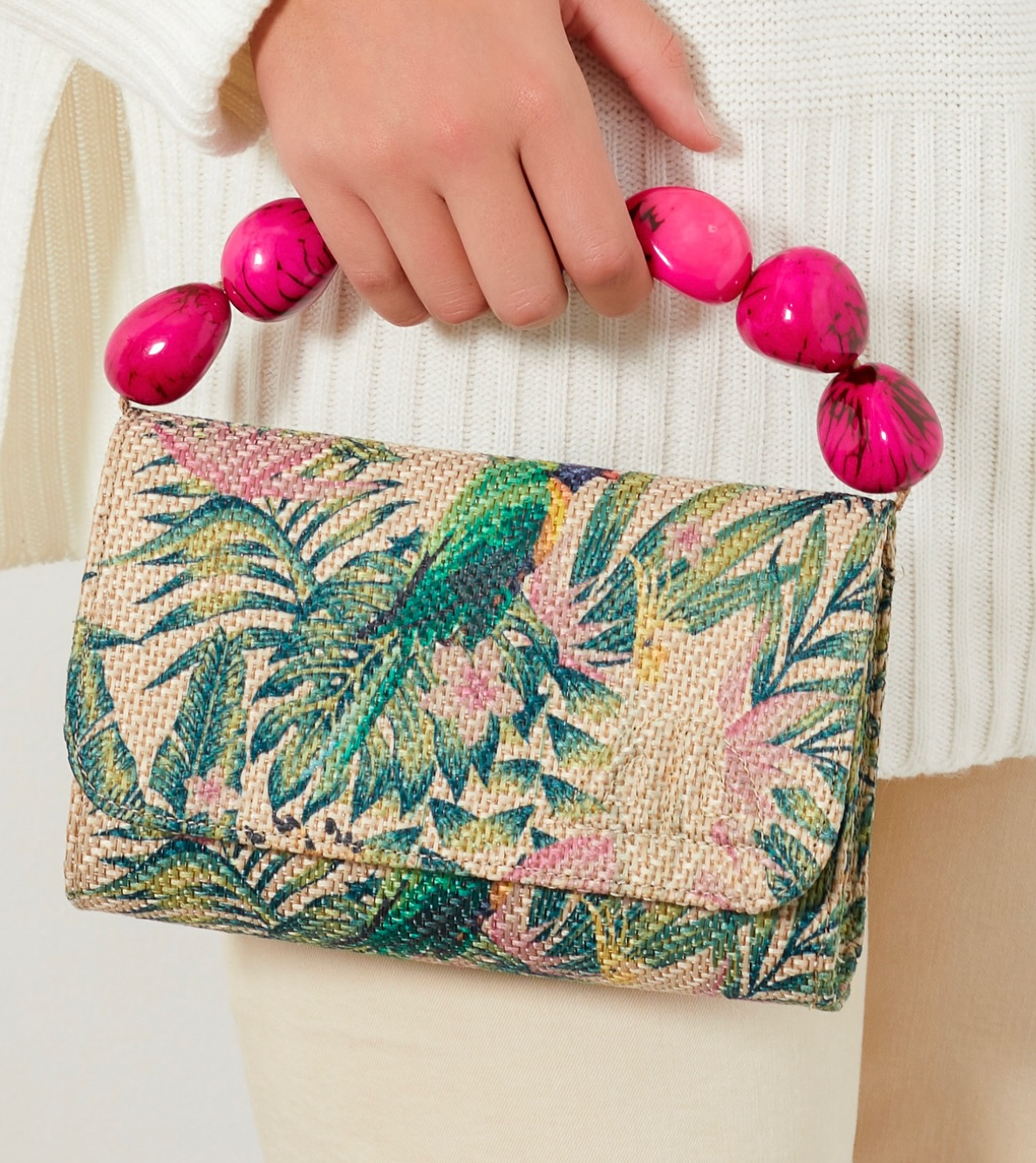 The Nica Rattan Clutch in Palma Green
