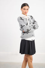 Load image into Gallery viewer, Sequin Bow Cardigan Sweater in Ash Dark Grey
