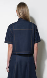Load image into Gallery viewer, Inez Denim Tie Neck Top in Indigo
