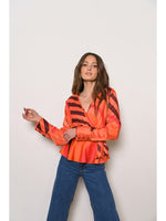 Load image into Gallery viewer, Veta Wrap Blouse in Coral Retro Geo
