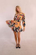 Load image into Gallery viewer, Tropical Floral Mini Wrap Dress in Mango Yellow Jane
