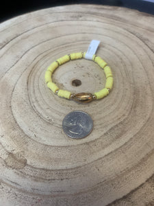 Gold Puka Shell Bracelet in Yellow