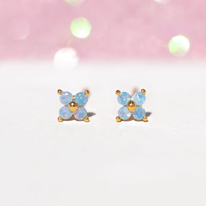 Teeny Tiny Blue Blossom Studs in Gold